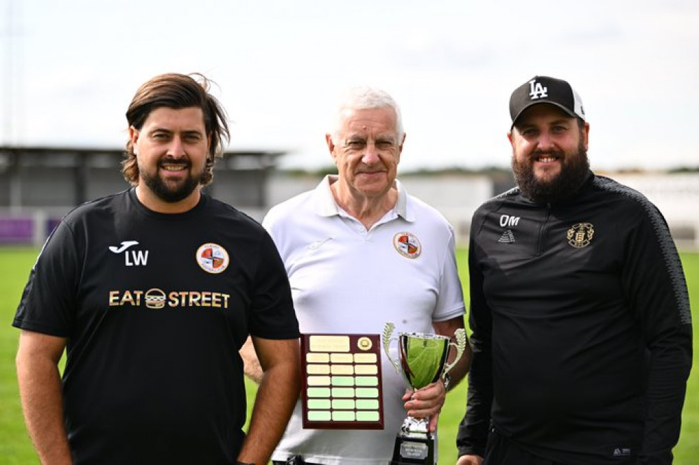 Honours were even in Saturday's derby match. Opposing coaches Liam Wallace and  Darren Manning are pictured with local football stalwart Alec Berry.