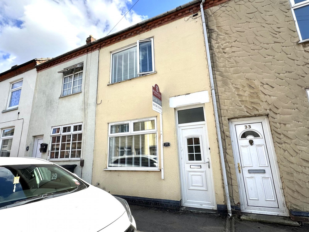 Brick-fronted terrace with welcoming kerb appeal