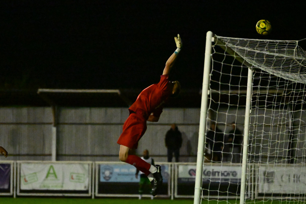 Max Appauh’s cross from afree kick is headed on by Sam Carter but Bradley Robinson got a fingertip on the effort to push the ball over the bar. Picture by Paul Bocking, InFocus Photos.