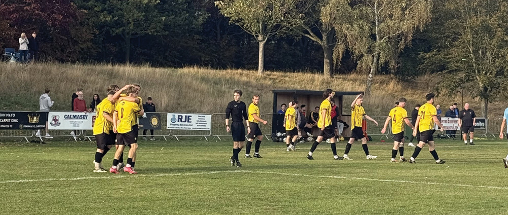 Rocks celebrate the winning goal. 