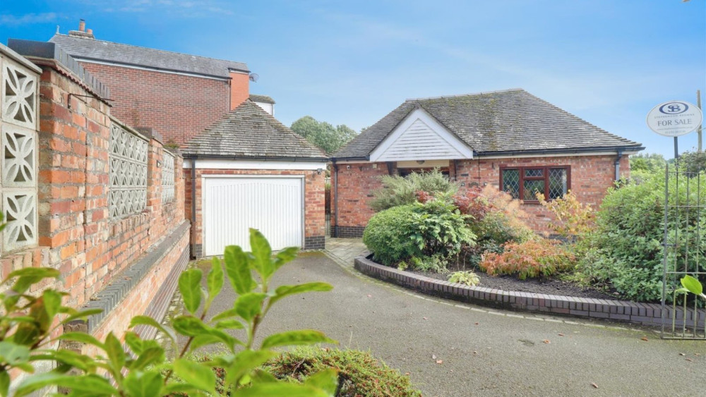 Privately positioned behind decorative iron gates, the property enjoys a sense of seclusion. (Photo: Stephenson Browne)
