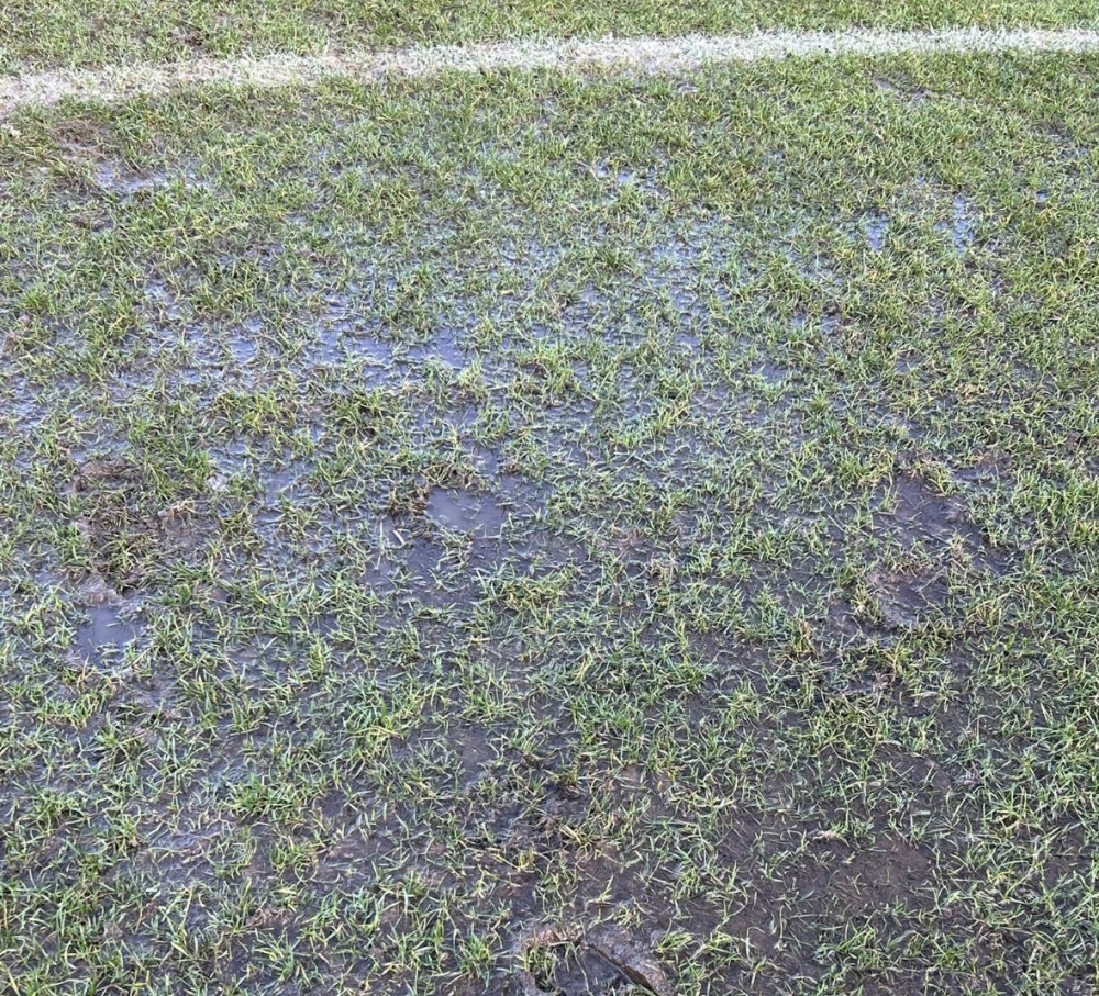 Waterlogged pitch means postponement 