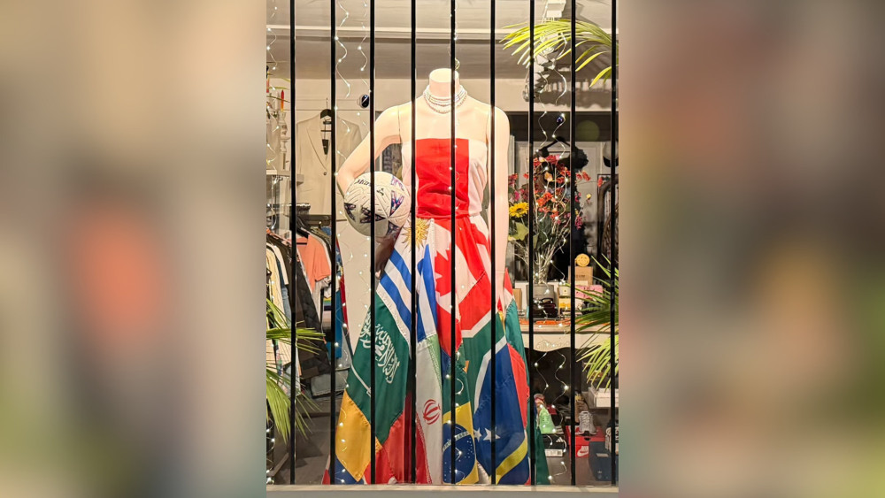 Twickenham designer creates FIFA World Cup dress out of 48 nation flags